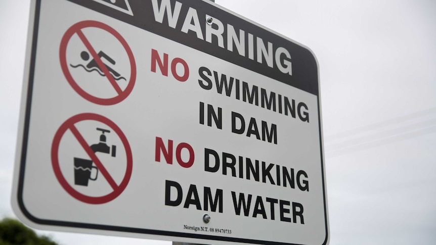No swimming in dam sign