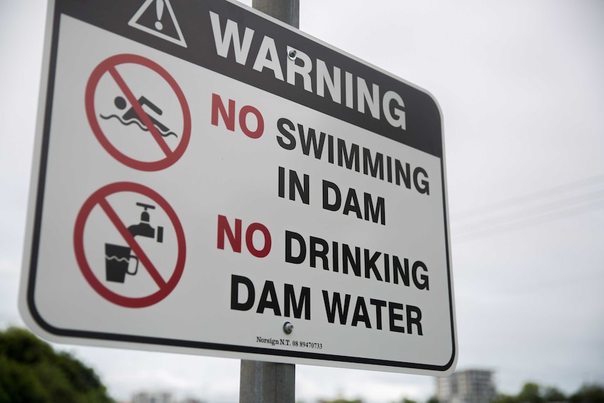 No swimming in dam sign