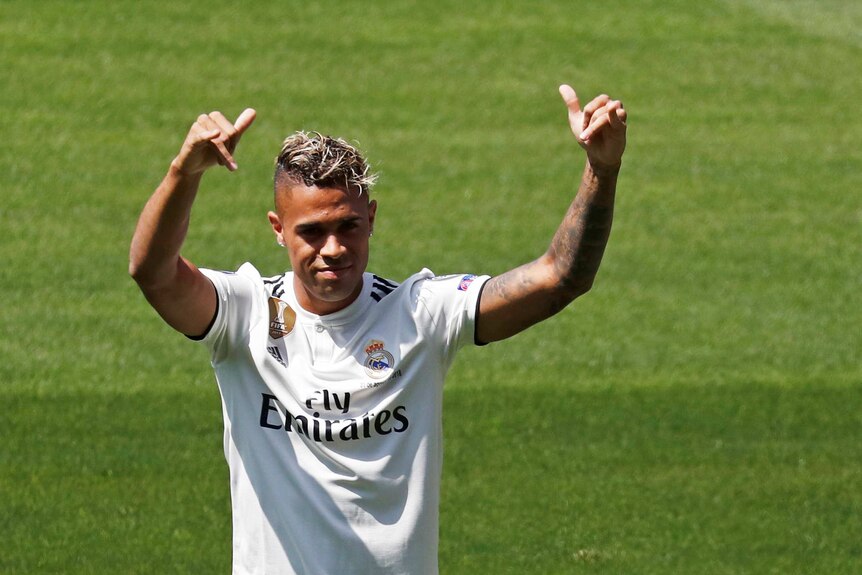 Real Madrid's Mariano Diaz gestures to fans