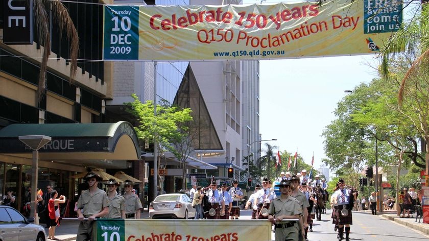 The Q150 Proclamation Day parade makes its way down George Street in Brisbane's CBD.