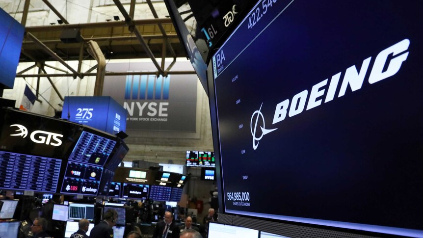 The company logo for Boeing is displayed on a screen on the floor of the New York Stock Exchange (NYSE) on March 11, 2019.