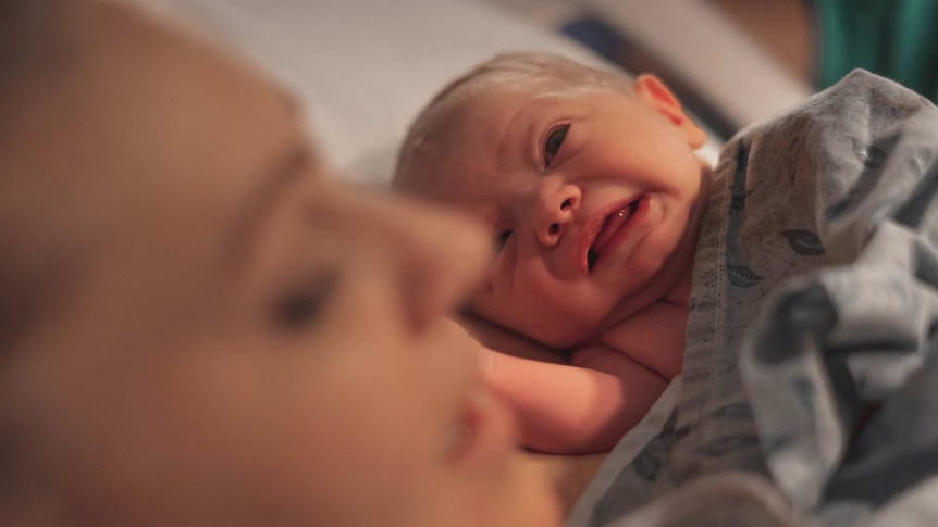 Newborn baby with mum