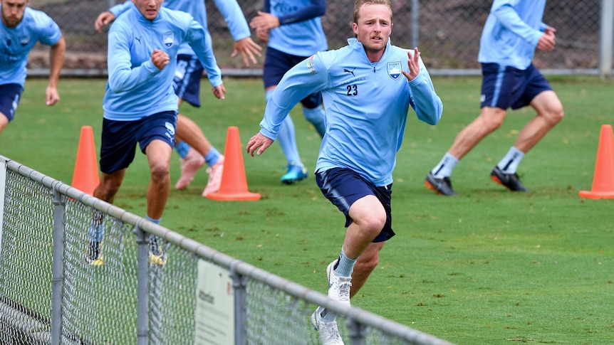Sydney FC defender Rhyan Grant goes through his paces during training.