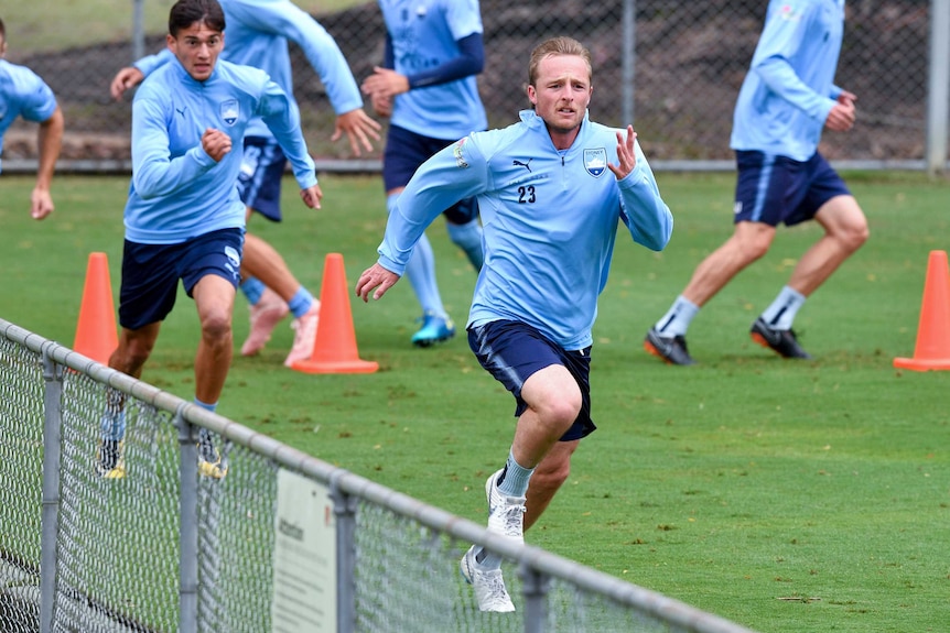 Sydney FC defender Rhyan Grant goes through his paces during training.