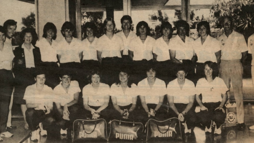 A newspaper photo of a women's football team in shirts