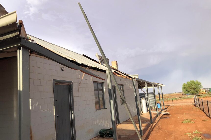 Damaged roofs on building on an outback station in Far West NSW.