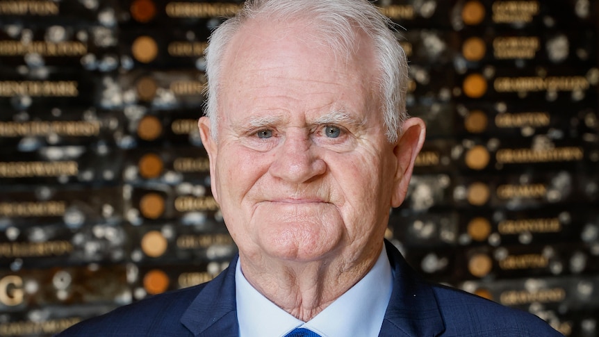 Close up photo of an older white male with blue eyes 