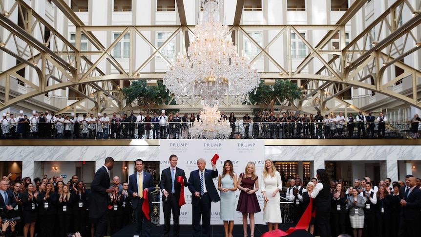 Donald Trump and family cut the ribbon at new hotel in Washington, DC