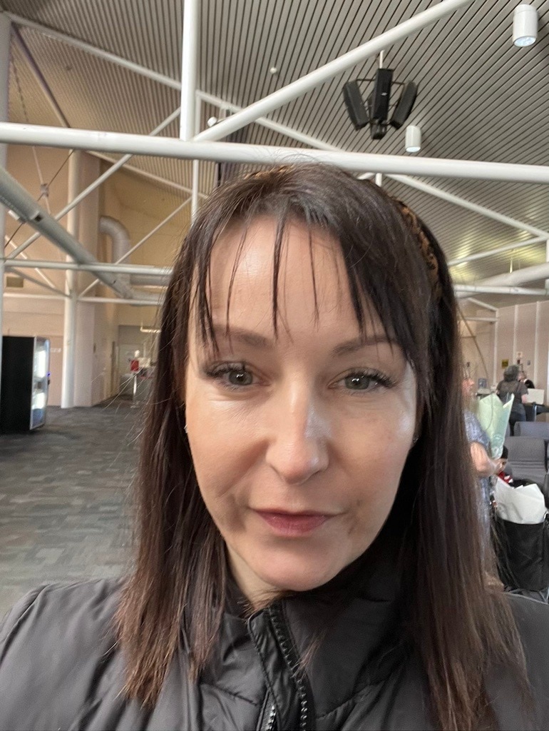 A woman looking at the camera intensely