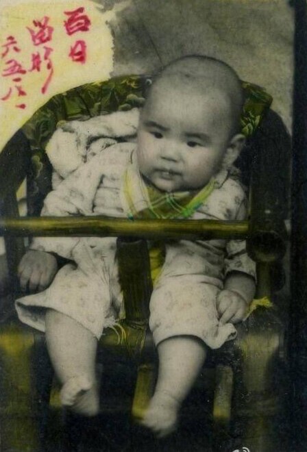 A black and white photo of baby Yang.