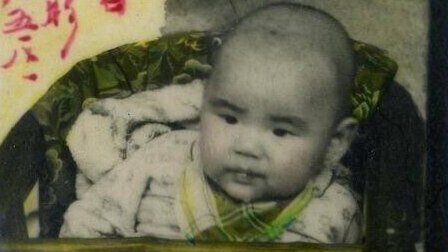 A black and white photo of baby Yang.