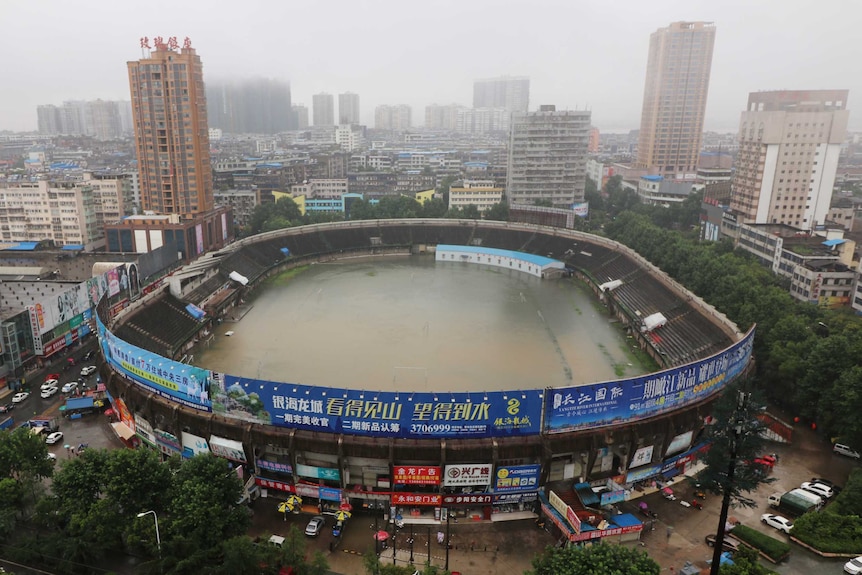 An aerial view of a stadium filled with water.