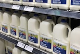 A shelf of three-litre milk