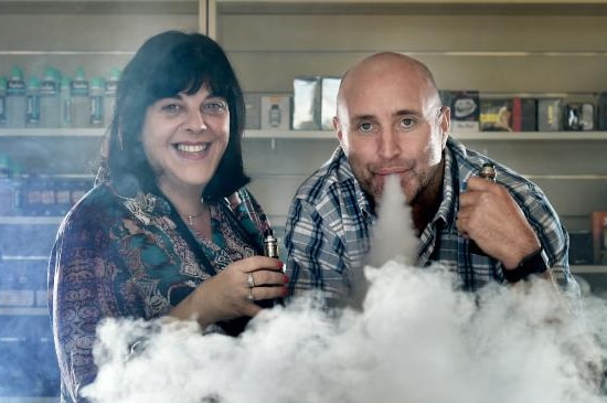 Craig and Anna Jackman with heaps of smoke from a vape.