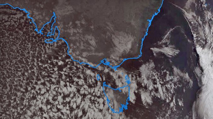 Satellite image shows snow clouds nearing Tasmania