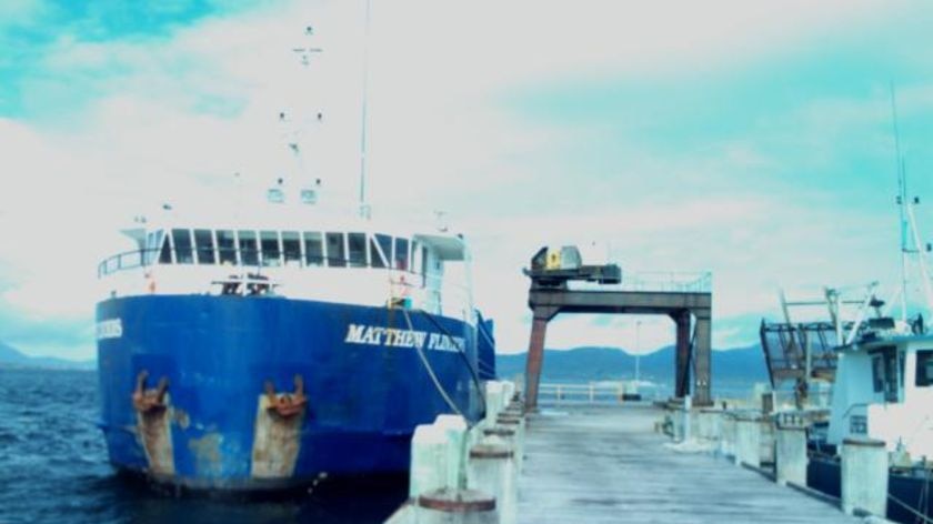 Freight ship Matthew Flinders tied up at Lady Barron wharf, Flinders Island.