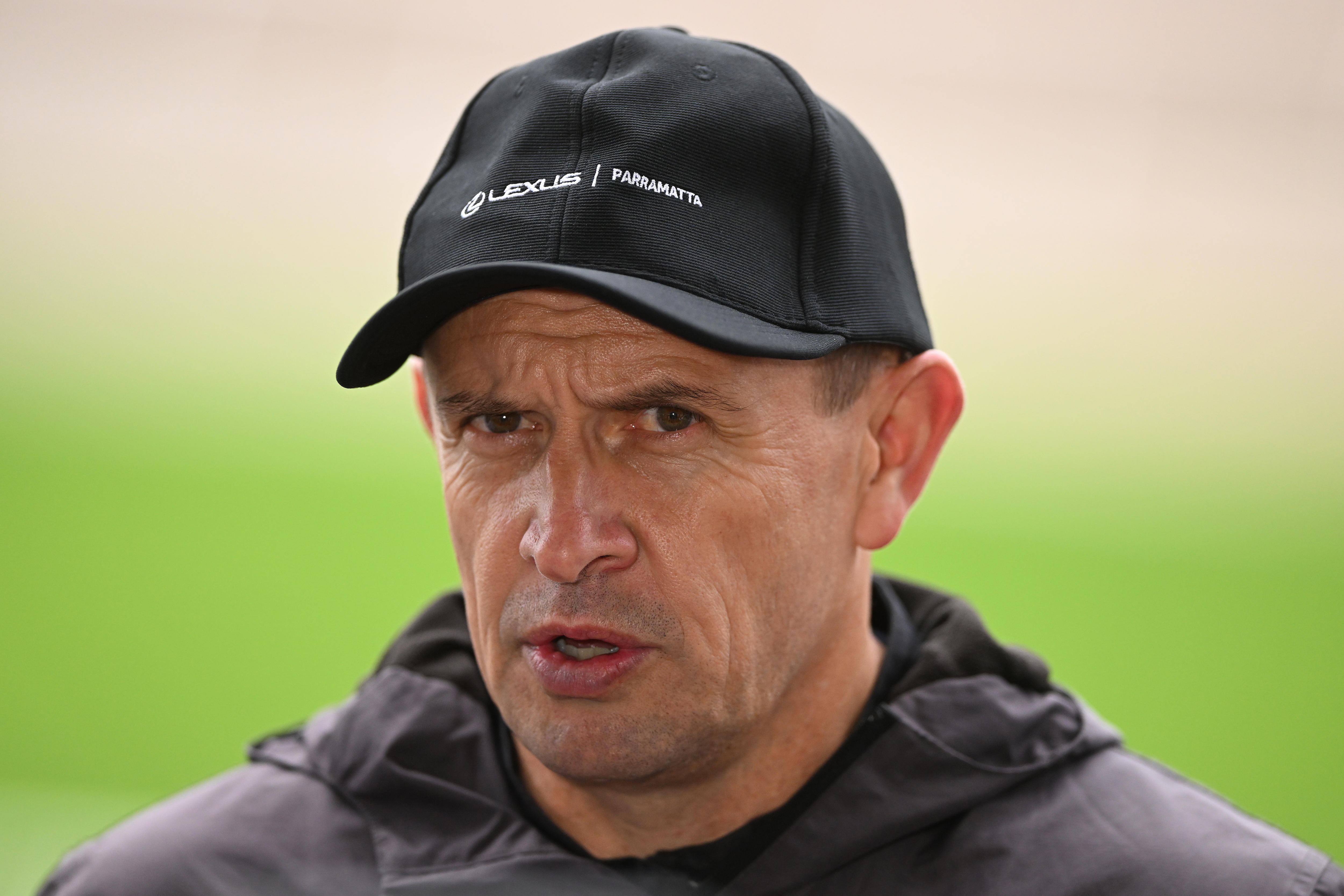 Coach Chris Waller speaks to the media during track work