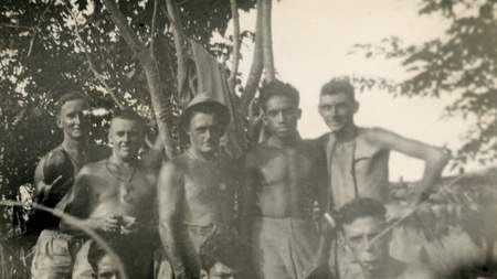 Private Max 'Eddie' Gilbert (top right), shortly before the Japanese attack in Ambon.