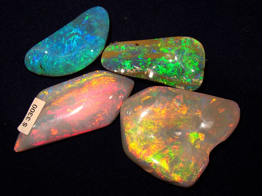 Опал искатели. Мадагаскарский опал. Мадагаскарский опал. Черный опал арлекин. Фотонный кристалл яблоновича.