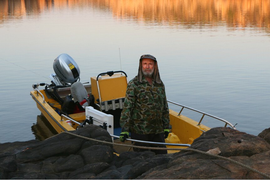 Don McLeod in his boat on the Drysdale River in the Kimberley