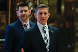 Michael Flynn stands up in front of media