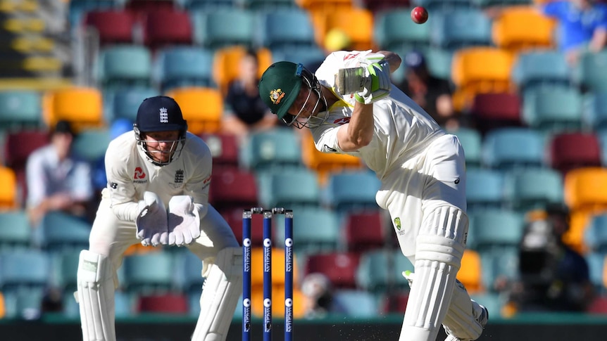 Australia's Cameron Bancroft hits a six off England's Moeen Ali on day four at the Gabba.