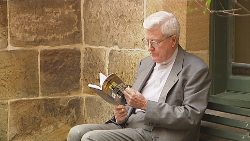 Bishop Geoffrey Robinson with his book For Christ's Sake in 2013.