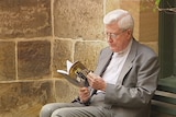 Bishop Geoffrey Robinson with his book For Christ's Sake in 2013.