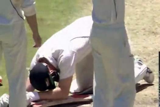 TV still of Adam Voges on the ground after being hit by bouncer