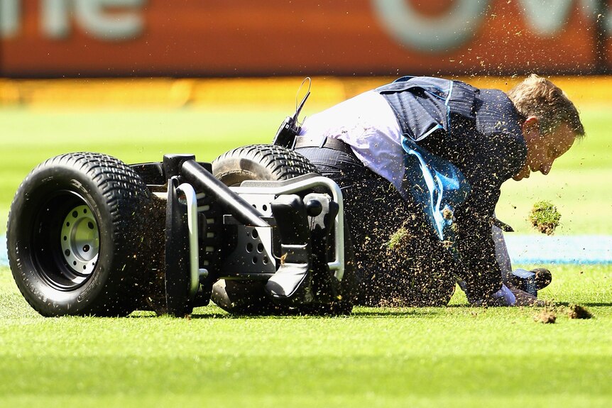 Ian Healy crashes on a Segway at the MCG