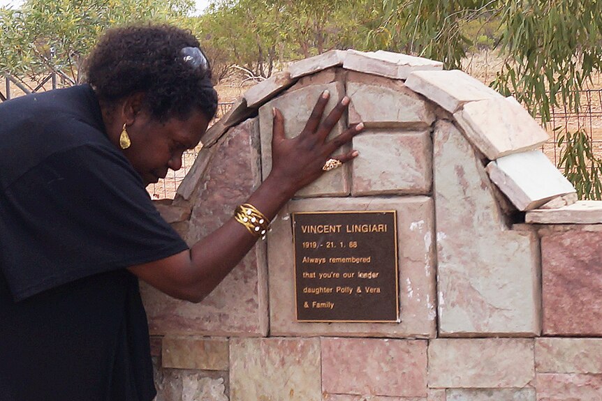 Eddie Mabo's daughter Celuia at grave of land rights pioneer Vincent Lingiari.