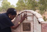 Eddie Mabo's daughter Celuia at grave of land rights pioneer Vincent Lingiari.