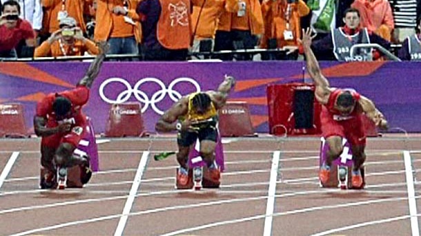 TV STILL: bottle behind runners ahead of 100m Olympic sprint final