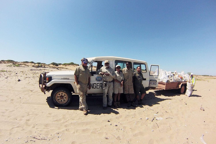 Mapoon land and sea rangers on beach at far northern tip of Qld Cape York in September 2014.