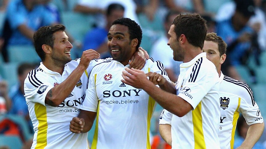 Shock win ... Phoenix striker Paul Ifill celebrates after scoring against Sydney FC