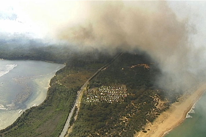 On the south coast, firefighters are trying to put in containment lines around fires at Burrill Lake