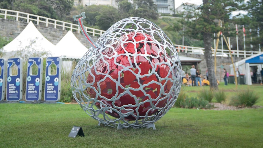 Sculpture “Space from the One” by Yong-Hwan Jeon features a puzzle-like apple.