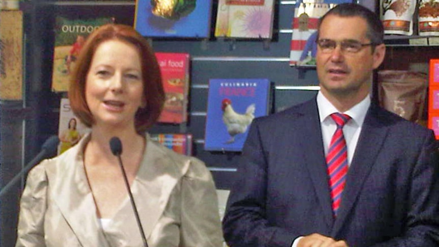 Prime Minister Julia Gillard and Communications Minister Stephen Conroy at a cafe in Perth