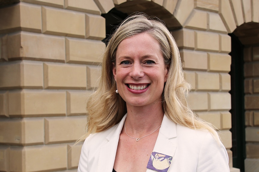 Rebecca White stands in front of Parliament House