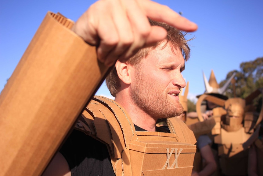 Boxwars event organiser Ross Koger rallies the troops before battle.