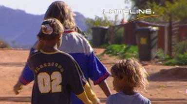 Children walk through an Indigenous community