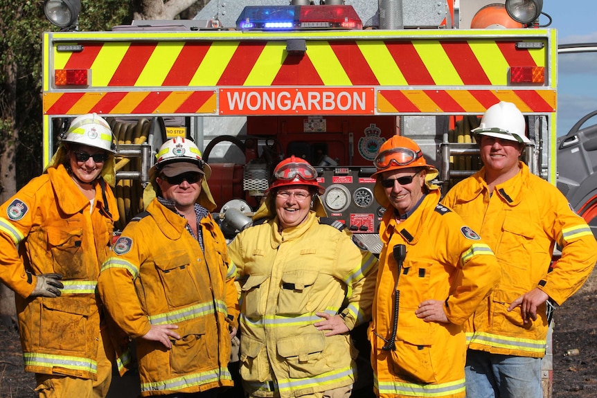 Carole shares a laugh with her fire-fighting brigade