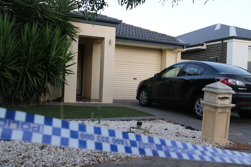 Police tape outside a Gilles Plains home.