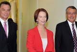 Julia Gillard leaves with Wayne Swan and Craig Emerson after the leadership vote.