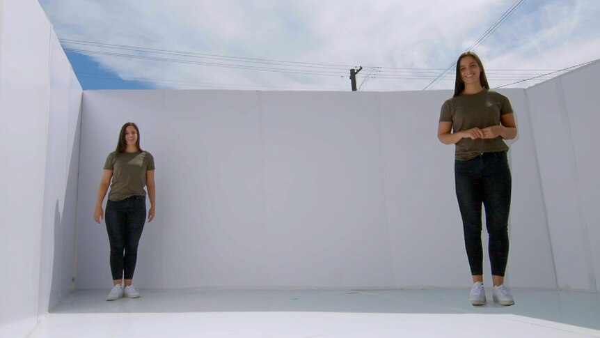 woman standing in two different sides of a box