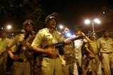 Standing guard: Mumbai police.