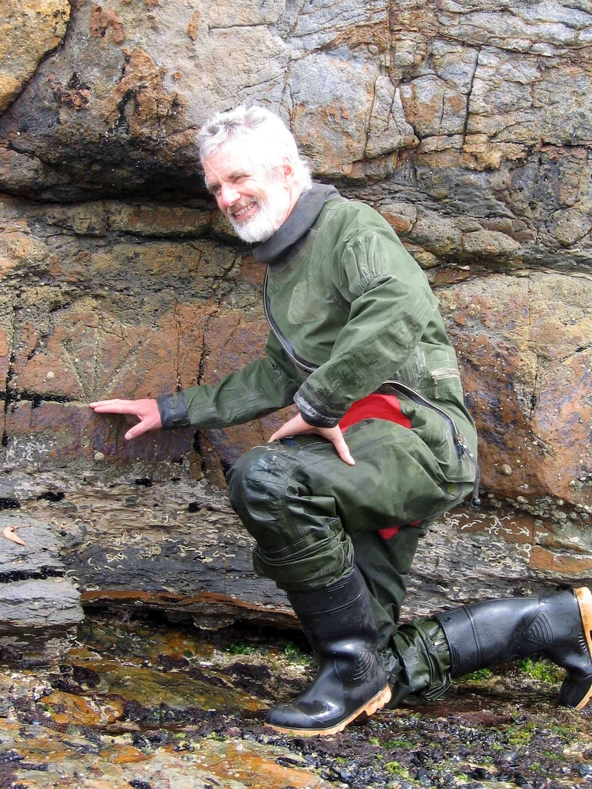 John Hunter next to the Port Arthur sea gauge