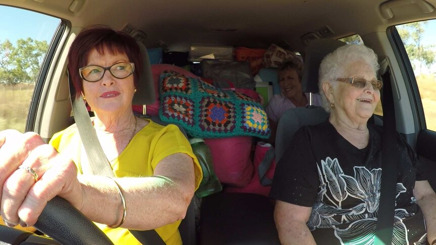 Two hairdressers in the front seat and Back Roads presenter Heather Ewart in the backseat to Normanton