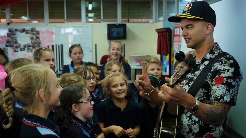 Guy Sebastian and students