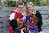 Jacob Scully and Gabriella Phillips with puppets